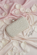 Pearl Clutch Flat Lay